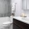 Bath with dual vanity, large mirror and glass enclosed showerA