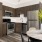 Open kitchen and living room with plenty of natural light.
