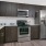 Open kitchen and living room with plenty of natural light.