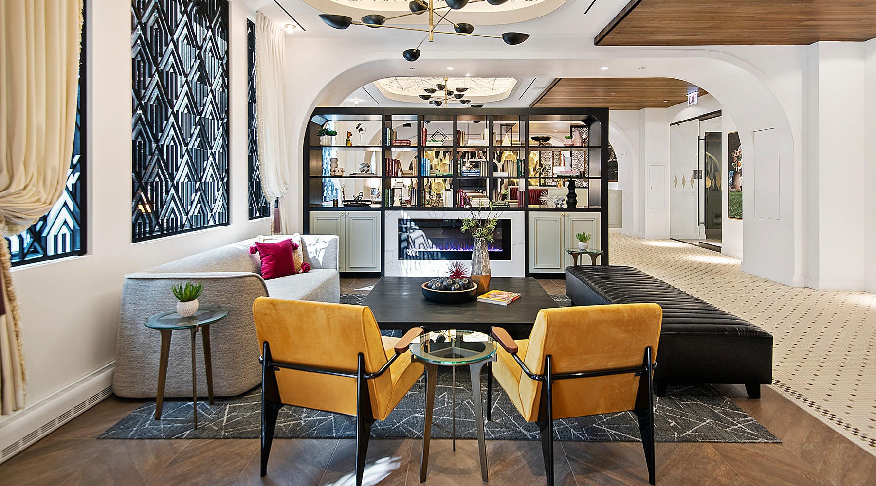 Clubhouse Resident clubhouse with ample seating, fireplace, demo kitchen and TVs