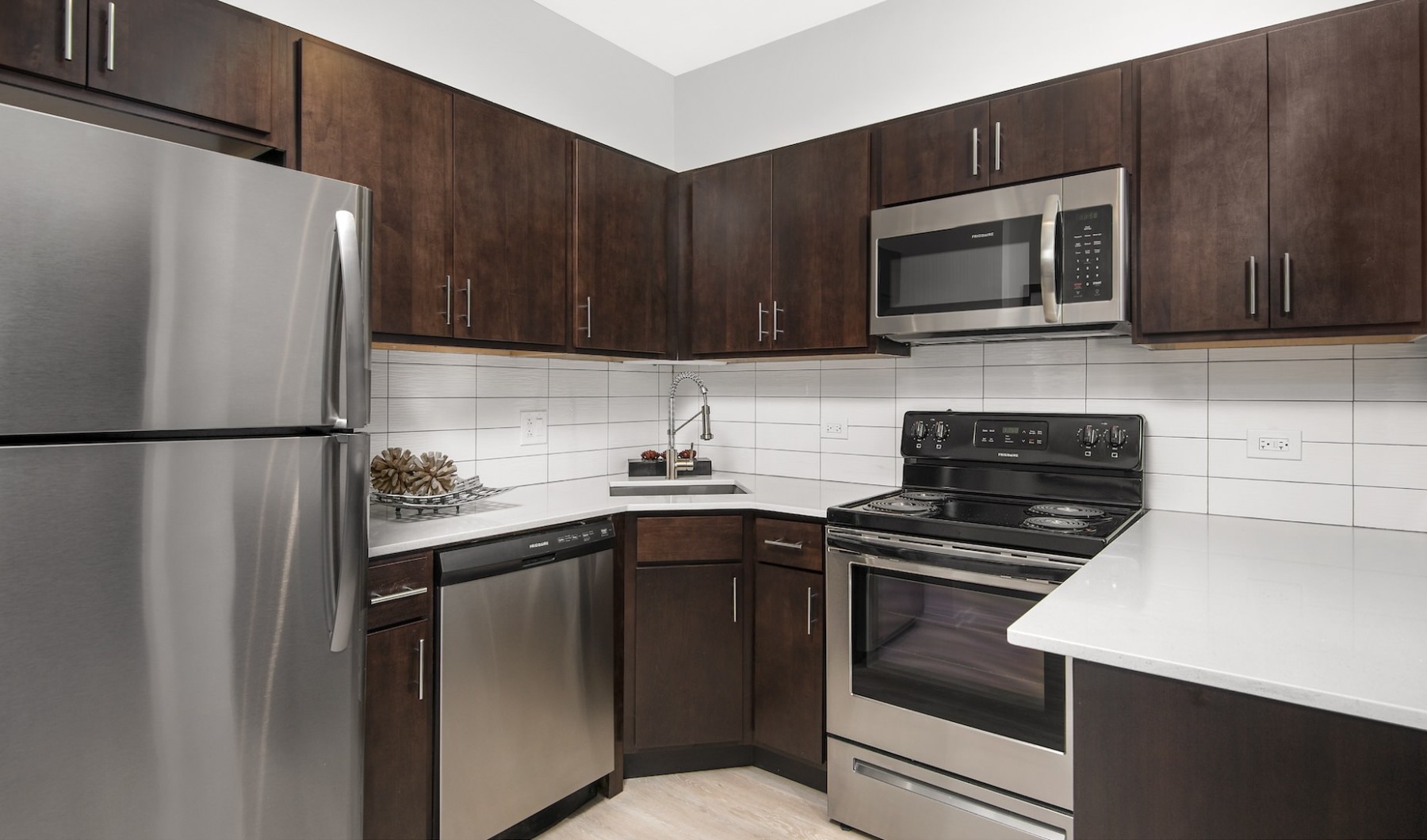 Kitchen Open kitchen and living room with plenty of natural light.
